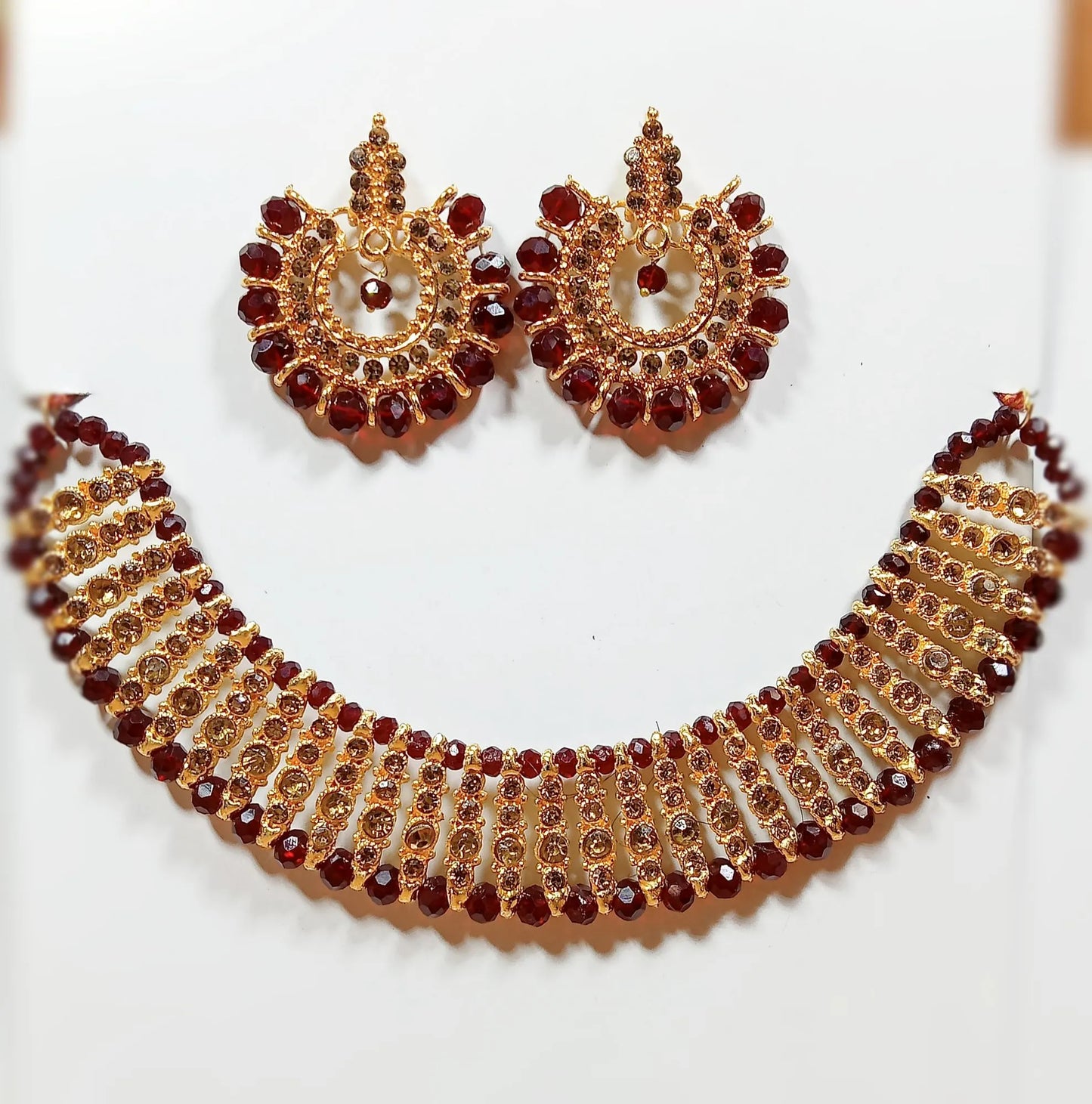 Black colour artificial jewellery set of round crystal earrings and chowker neckless