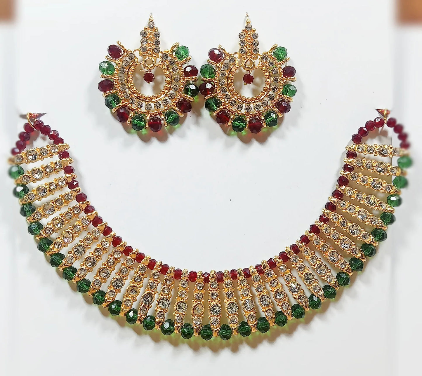 Black colour artificial jewellery set of round crystal earrings and chowker neckless