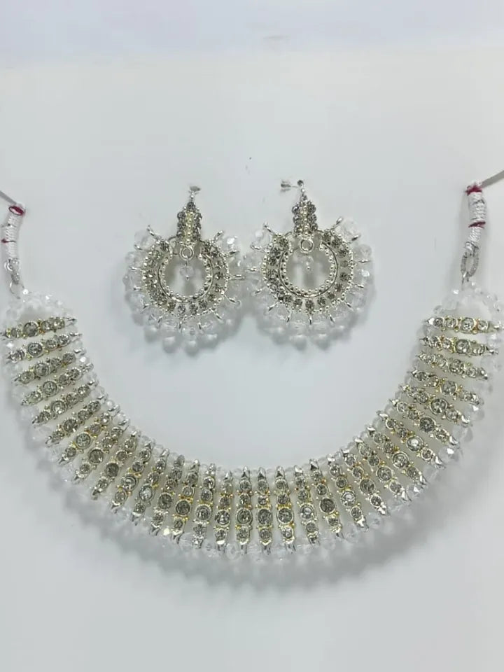 Black colour artificial jewellery set of round crystal earrings and chowker neckless